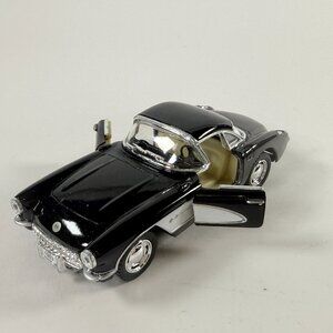 Kinsmart 1957 Chevrolet Corvette Black white Diecast 1:36 Sports Car open doors